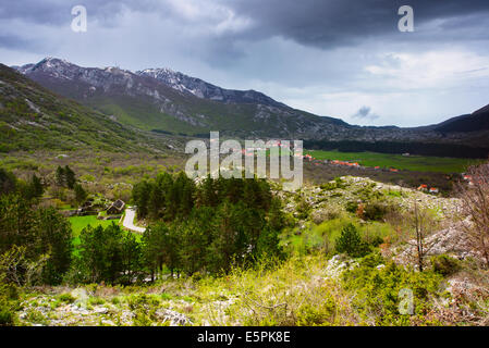 View from above to the small village in Montenegro mountains. Stock Photo