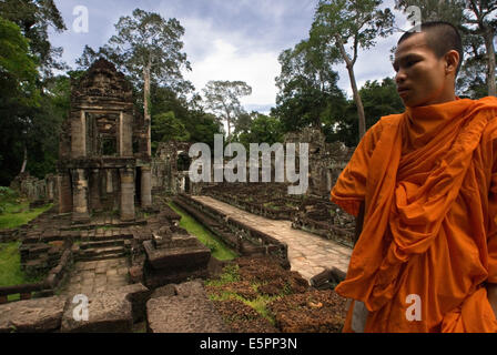 A monk in Bakan or Preah Khan Kampong Svay Temple. The Bakan temples are located in Ta Siang village, Ronakse commune, Sangkum T Stock Photo
