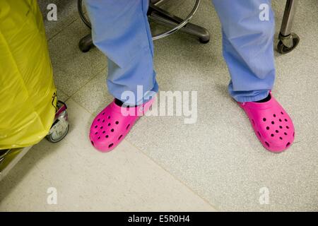 Nurse wearing plastic shoes hospital hi-res stock photography and images -  Alamy