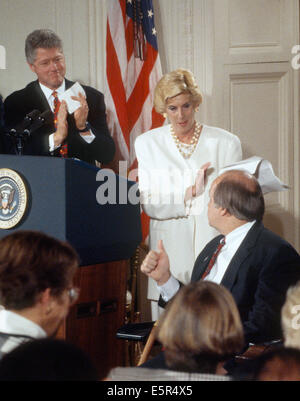 US. 4th Aug, 2014. FILE PIX: United States President Bill Clinton, left, and Sarah Brady, center, applaud as former White House press secretary James S. Brady, right, flashes a 'thumbs-up' during the 'Brady Bill' signing ceremony in the East Room of the White House in Washington, DC on November 30, 1993. Brady passed away on Monday, August 4, 2014. Credit:  dpa picture alliance/Alamy Live News Stock Photo