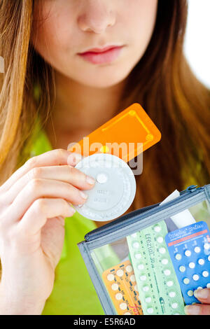 Woman holding the Norlevo morning-after pill (emergency contraceptive pill). Stock Photo