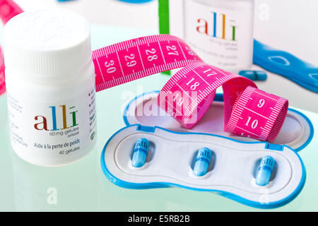 Alli is a half-dose version of the diet drug Xenical (Orlistat) produced by GlaxoSmithKline (GSK). Stock Photo