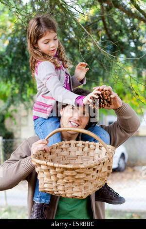 13 year old girl carrying water in clay pot on her head 