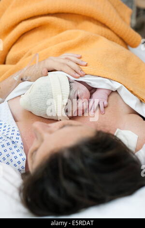Woman in labor room during delivery, Obstetrics and gynaecology department, Saintonges hospital, Saintes, France. Stock Photo