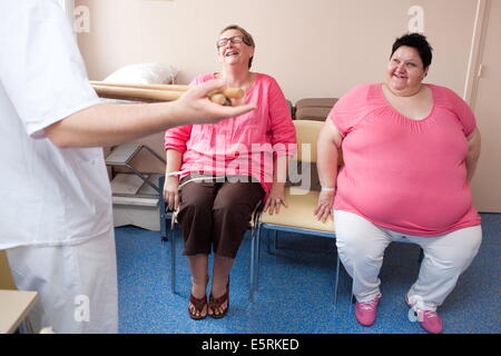 Female patients following an exercise program with a physiotherapist, Limoges hospital offers its obese patients requiring Stock Photo