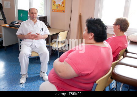 Female patients following an exercise program with a physiotherapist, Limoges hospital offers its obese patients requiring Stock Photo