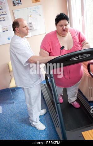 Female patient following an exercise program with a physiotherapist, Limoges hospital offers its obese patients requiring Stock Photo