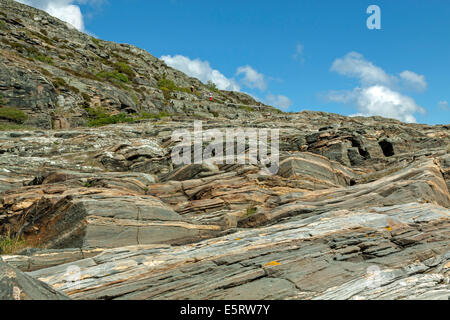 Hiking along the rocky coast on the island of Stora Dyrön, Tjörn Municipality, Bohuslan, Västra Götaland County, Sweden. Stock Photo