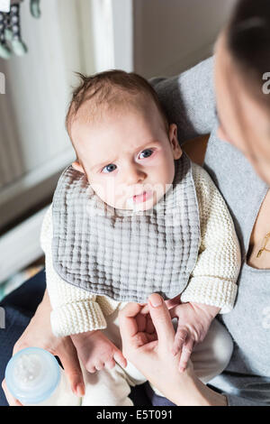 Oesophageal reflux of a 3 month old baby boy. Stock Photo