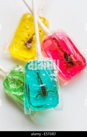 Edible scorpions in a lollipop. Stock Photo
