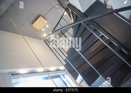 Interior metal dark spiral staircase, stock photo Stock Photo