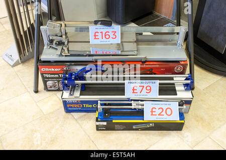Display of ceramic tile cutters for sale in a UK tile shop Stock Photo