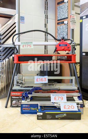 Display of ceramic tile cutters for sale in a UK tile shop Stock Photo