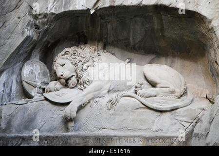 The Lion Monument, designed by Bertel Thorvaldsen and hewn in 1821 by Lukas Ahorn in Lucerne, Switzerland. Stock Photo