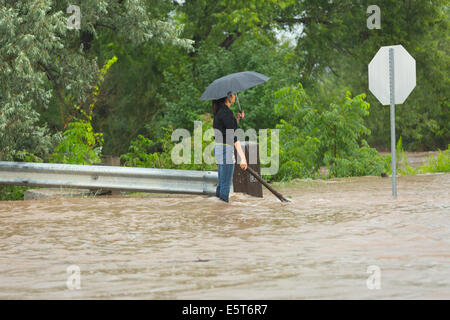 Thunderstorms create flash flooding in Oakville, Ontario turning roads into rivers stranding many & causing millions in damage Stock Photo