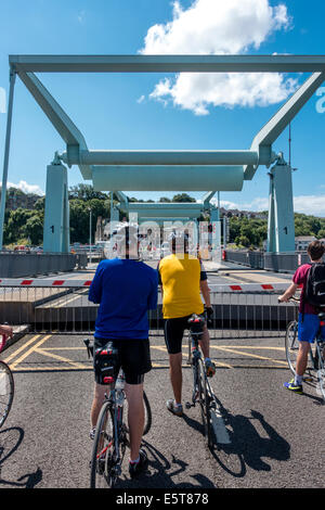 Bascule bridge raised over one of the 3 locks connecting Cardiff Bay to the Severn Estuary Stock Photo