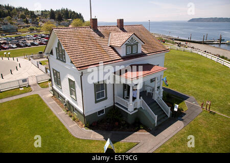 A view of the Keeper's house from Mukilteo's Lighthouse tower with a view Puget Sound beyond. Stock Photo