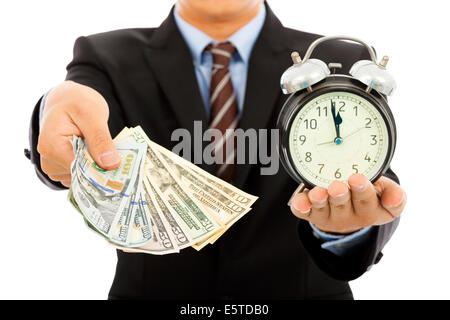 businessman holding money and clock. time is money concept Stock Photo