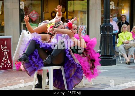 Oak Park, Illinois, USA. 5th August 2014.  Can Can dancers bring a taste of France to Marion Street during the Art dans la Rue festival in this Chicago suburb. Credit:  Todd Bannor/Alamy Live News Stock Photo