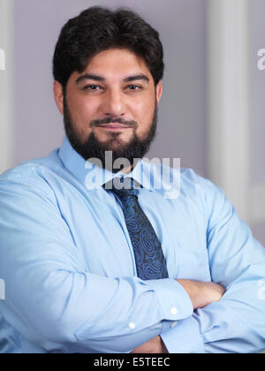 Portrait of a smiling Middle eastern businessman in his thirties Stock Photo