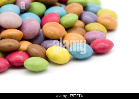 sweet dragees of different color on white background Stock Photo