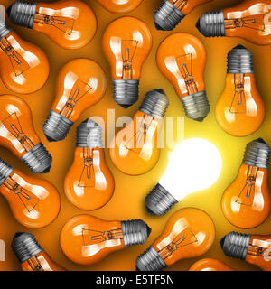 Idea concept with row of light bulbs and glowing bulb Stock Photo