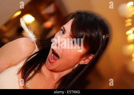 An attractive forty year old woman at a party Stock Photo