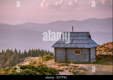 alone house in autumn mountain Stock Photo