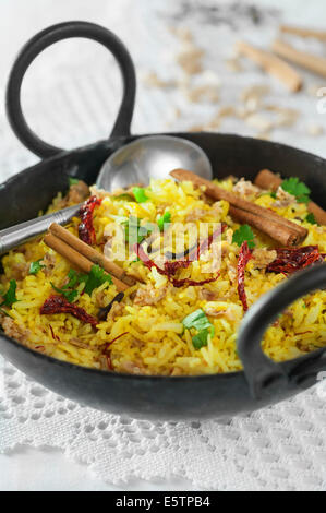 Pilau rice in karahi cooking pot Stock Photo