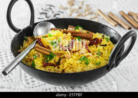 Pilau rice in karahi cooking pot Stock Photo