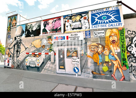 Germany, Berlin: Recreated wall paintings of the Berlin Wall at  the Store of East Side Gallery Stock Photo