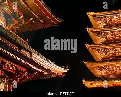 Senso-ji 5-story pagoda and Hozomon gate at night on the eve of Japanese New Year, Asakusa, Tokyo, Japan Stock Photo