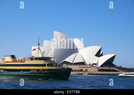 Sydney ferry passes the opera house on its approach to circular quay ferry terminus,sydney,australia Stock Photo