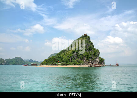 Small tropical karst island in Halong Bay - Vietnam Stock Photo