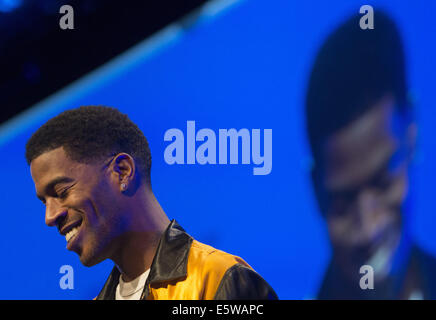 Los Angeles, CA, USA. 24th Apr, 2014. Rapper/actor SCOTT MESCUDI (AKA KID CUDI) speaks after being presented with the title of Mental Health Ambassador during the 18th Annual Erasing the Stigma event at the Beverly Hilton in Beverly Hills, California. © Miguel Vasconcellos/ZUMA Wire/Alamy Live News Stock Photo