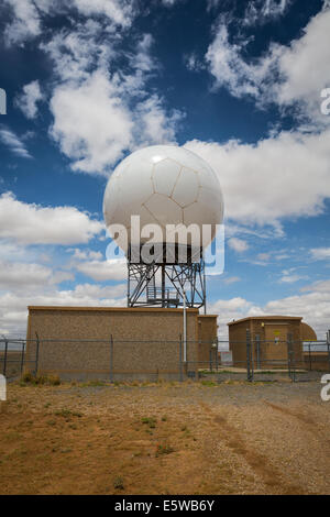 The National Weather Service Cannon Air Force Base New Mexico Nexrad KFDX radar dome and supporting infrastructure is visible. Stock Photo