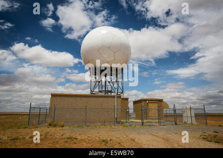 The National Weather Service Cannon Air Force Base New Mexico Nexrad KFDX radar dome and supporting infrastructure is visible. Stock Photo