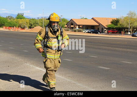 Firefighter Training in Protective Suit Stock Photo