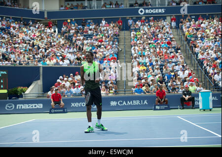 Toronto, Canada. 6th Aug, 2014. Gael Monfils of France serves to Novak Djokovic of Serbia during the Rogers Cup at the Rexall Centre on August 6, 2014 in Toronto, Ontario, Canada. Credit:  Julian Avram/Alamy Live News Stock Photo
