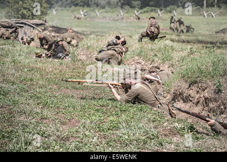 Reconstruction of a World War II fight between Red army and German army. Stock Photo