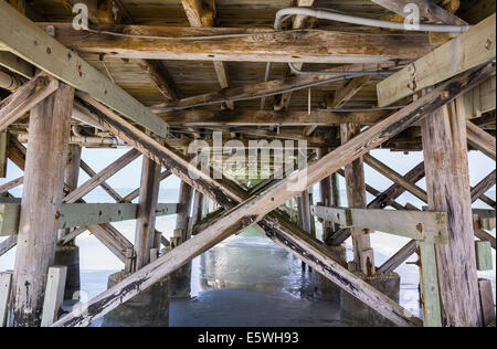 Underneath the pier at Redington Beach off Gulf Boulevard in Pinellas County, Florida, USA Stock Photo