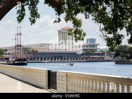 Tampa Convention Center on the riverbank, Tampa, Florida, USA - with tall ship Stock Photo