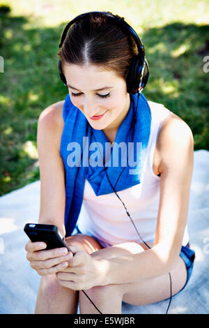 Woman listening to music Stock Photo