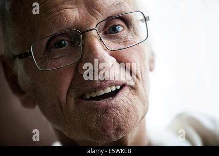 Elderly person indoors Stock Photo