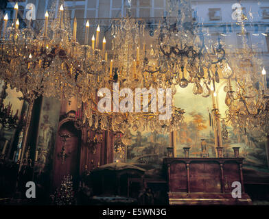 Window view of antiques store with reflection of typical Parisian apartments. Stock Photo