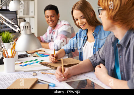 Group of students making construction sketch in college Stock Photo