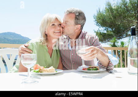 Couple celebrating on holiday, Mallorca, Spain Stock Photo