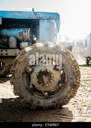 Close up of old rustic tractor in farmyard Stock Photo