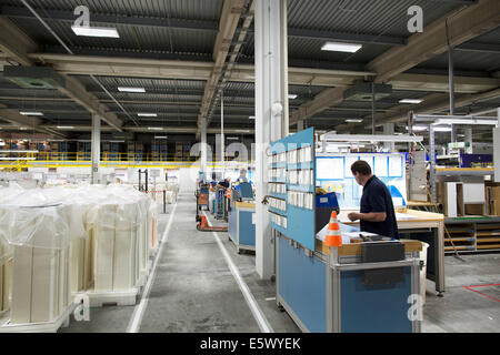Workers in paper packaging factory Stock Photo