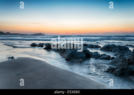 Sunset on Lusty Glaze beach at Newquay in Cornwall Stock Photo